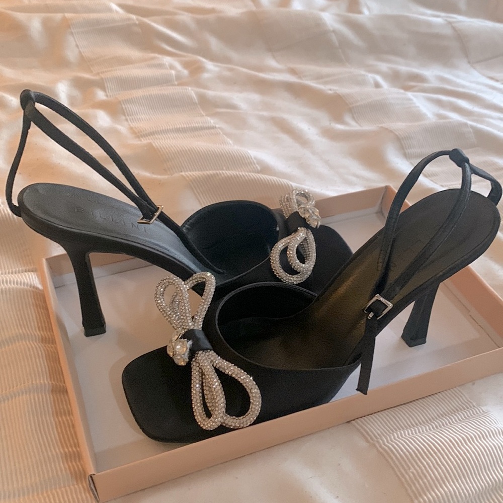 Black cocktail dress shoes. Only worn once- No damage.